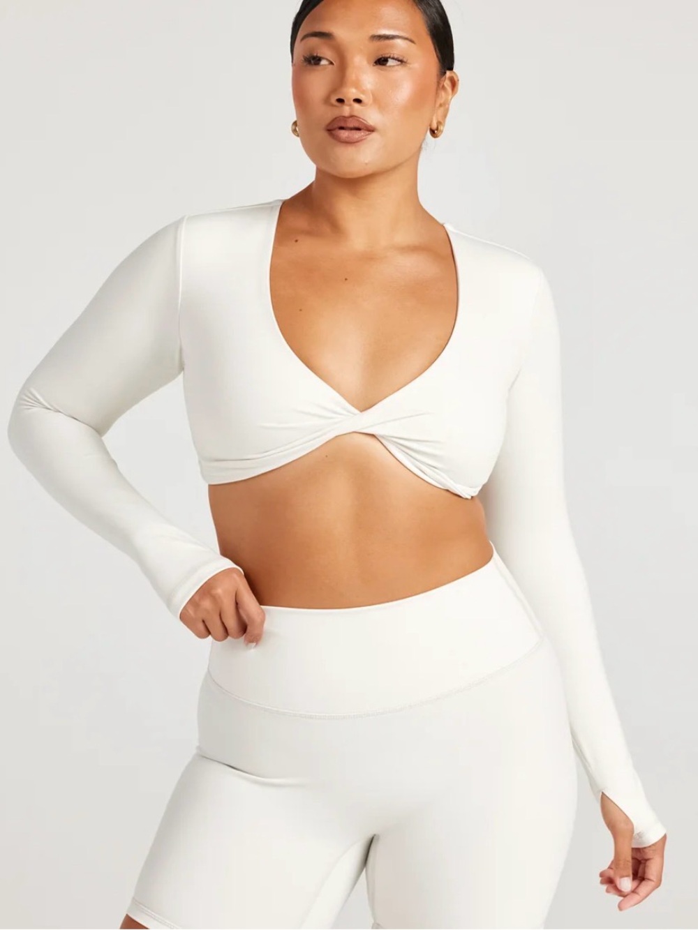 Elite Eleven Long Sleeve Twist-Front Crop Top in vanilla latte